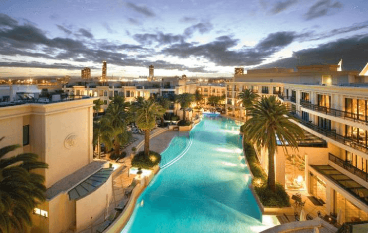 Rendered amenities of Santo Resort, hotels, villas, marina, and beach club.